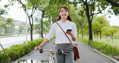 Asian woman in streets of commuting