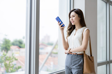 businesswoman use smart phone