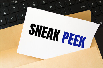 Text sign showing SNEAK PEEK