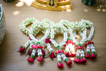 Close-up background Of Buddha images and flowers for ceremonies on auspicious days (New Year, Songkran Festival)