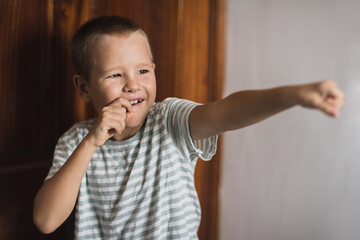 Indoor portrait of a cute boy