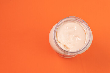Mayonnaise can on the orange background