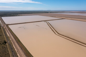 Huge water filled dams in the far outback of New South Wales ready to feed cotton crops.
