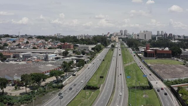 Aerial view of city life scene. Highway aerial landscape. Transportation scene.