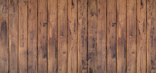 Brown wood texture background coming from natural tree. The wooden panel has a beautiful dark pattern, hardwood floor texture