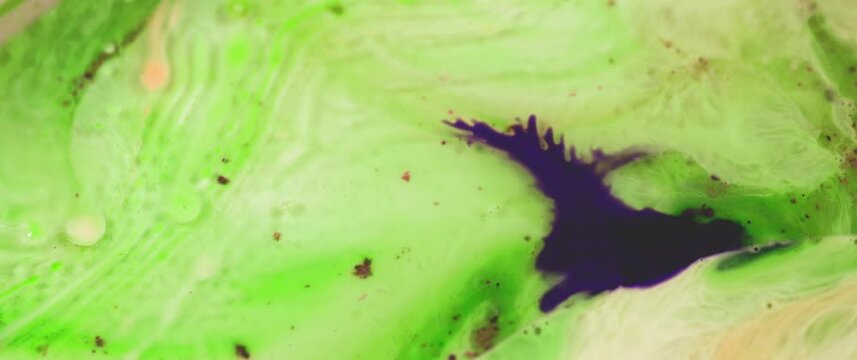 Macro Textures with Vibrant Neon Color Palette. Abstract Background Made with Oil Mixed with Green and Purple Dye, Ink, and Paint.