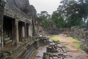  Bayon the central temple of Angkor Thom, late 12th century. It rains in the rainy season....