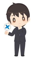 不正解のプラカードを持つビジネススーツ姿の男性