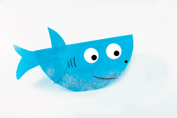 DIY and kids creativity. Making shark from paper. Children Craft workshop