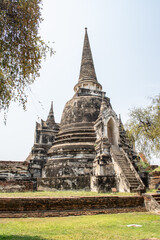 Fototapeta premium Old pagodas within Wat Phra Si Sanphet was the holiest temple in Ayutthaya that is ancient capital of Thailand 