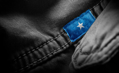 Tag on dark clothing in the form of the flag of the Somalia