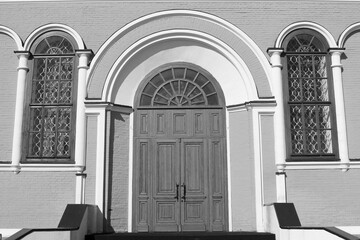 Wooden door in an old stone building