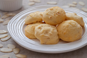 Butter cookies with almond on white plate