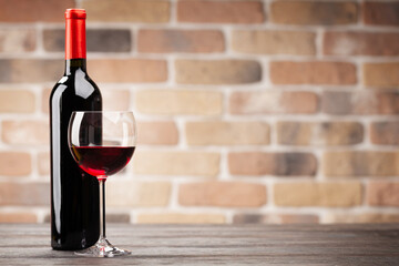 Wine bottle and glass of red wine