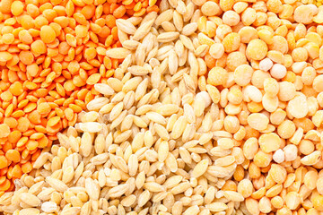 Heap of different cereals and legumes as background