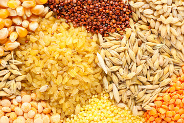 Heap of different cereals and legumes as background