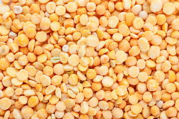 Heap of dry split peas as background