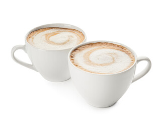 Cups of hot cappuccino coffee on white background
