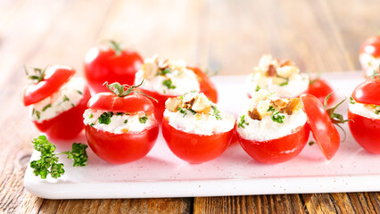 stuffed cherry tomato with cheese cream
