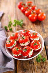stuffed cherry tomato with cheese cream