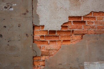 old brick wall with hole