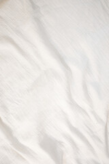 Fabric backdrop White linen canvas crumpled natural cotton fabric Natural handmade linen top view background Organic Eco textiles White Fabric texture