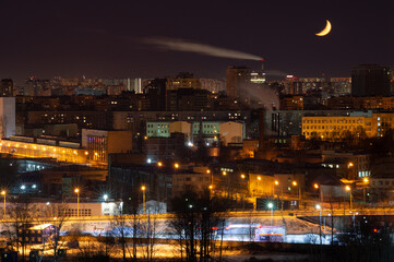 Night industrial city orange lights buildings