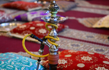 the hookah to smoke aromatic tobacco