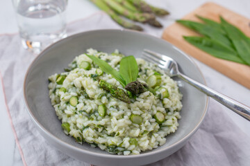 Spring food; Delicious risotto with asparagus and wild garlic