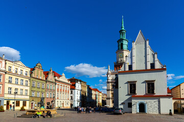 Fototapeta premium View of historic building of Weighing house and Town Hall in centre of Poznan Market Square in sunny spring day, Poland