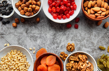 Bowls with various dried fruits and nuts