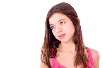 Beautiful young teen girl with brackets on teeth in white