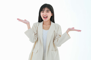 Young asian business woman posing to camera in gesture for advertising, presenting or demonstrate something with cheeful and positive action, isolated on white background