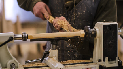 Woodwork and furniture making. Joinery, woodworking and furniture making, professional carpenter cutting wood in carpentry shop, industrial concept