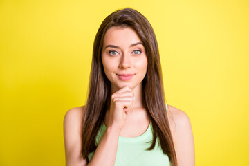 Fototapeta premium Photo of minded smart cute lady finger chin look camera wear green top isolated yellow color background