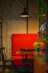 Restaurant interior background, red and green tones. Inside an empty restaurant