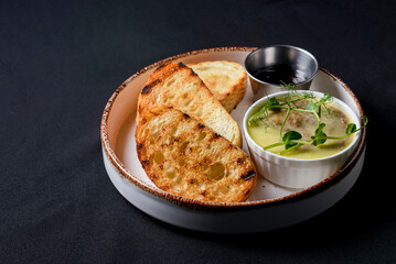 Toasted bread with pate and jam. Delicious sandwich with meat pate and fruit jam.