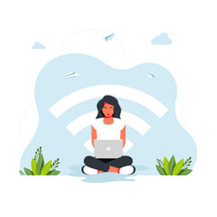 free wifi zone. Public free wifi hotspot zone wireless connection, business concept. woman sitting in lotus position working at a laptop against the background of a large wi-fi icon. freelance concept