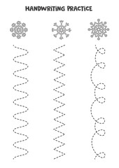 Tracing lines with black and white snowflakes. Writing practice.
