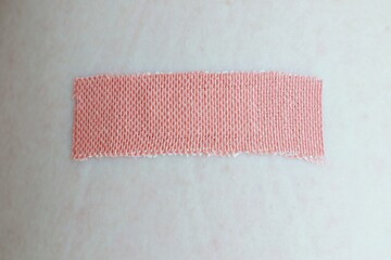 Adhesive bandage plaster on skin after inject vaccine or medicine.