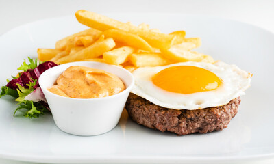 cutlet with egg and french fries