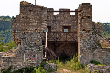 Exterior view of the ruins from Stone fortress tower from of the medieval town of Cherven in Bulgaria 