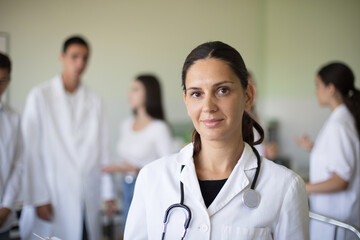 Portrait of female doctor in hospital.