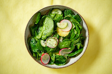 fresh salad with spinach and radish