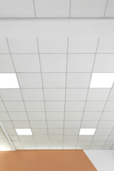 White ceiling in office room. Interior design