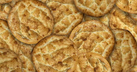Top view Ramadan pita background. bread lined side by side. traditional ramadan bread