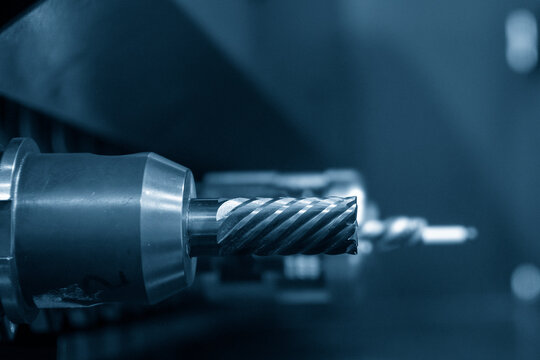 The square type solid end mill  tool in the tooling magazine of machining center. The automatic toll change ,ATC operation concept on the CNC milling machine.