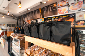 Black coffee bags on the shelves sold in the coffee shop.