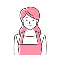 笑顔のエプロン姿の若い女性