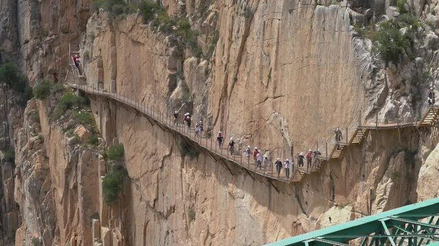People in Royal Trail (El Caminito del Rey) in Gorge of the Gaitanes Chorro, Malaga province, Spain.